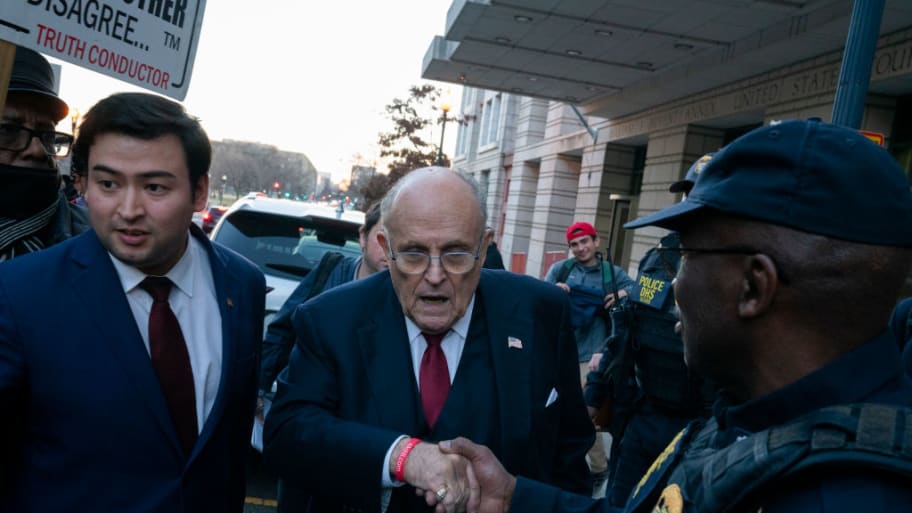 Giuliani leaving the courthouse in his defamation trial.