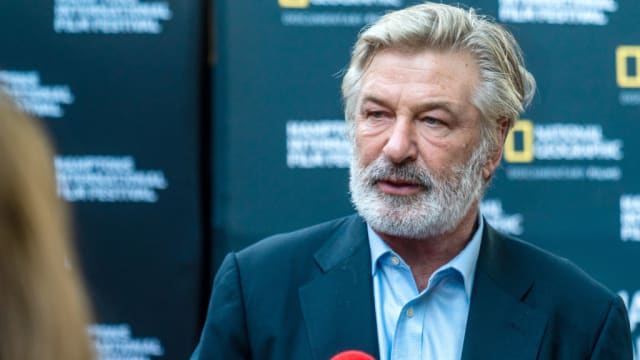 Alec Baldwin and a film armorer were formally charged Tuesday with involuntary manslaughter.