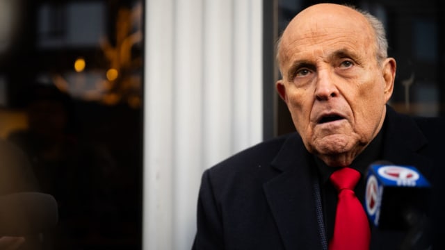 Rudy Giuliani speaks to members of the media where Republican candidate Florida Gov. Ron DeSantis was scheduled to host a campaign event on January 21, 2024 in Manchester, New Hampshire.