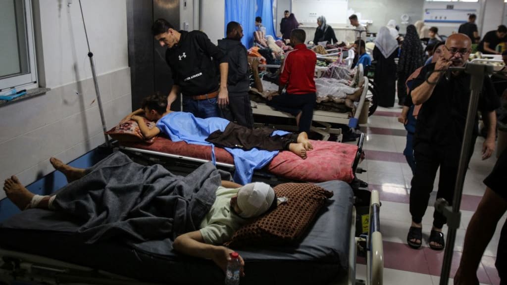 Patients are packed into the hallways of the Al-Shifa hospital in Gaza.
