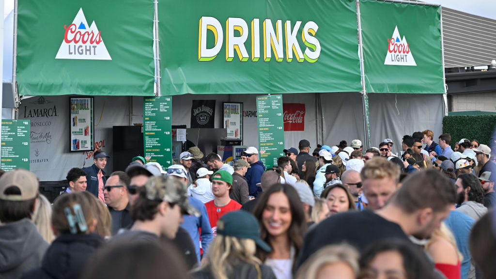 Fans stand near concessions stands during the third round of the WM Phoenix Open.