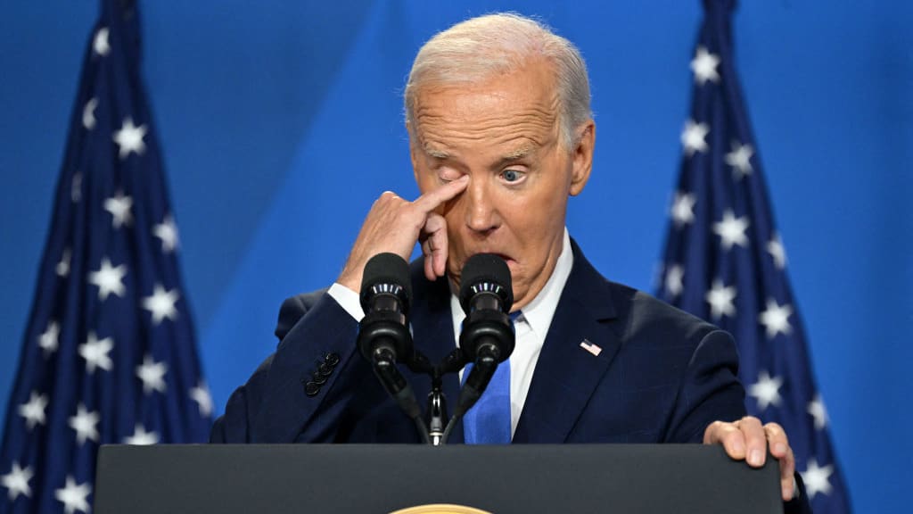 "US President Joe Biden gestures as he speaks during a press conference at the close of the 75th NATO Summit in Washington, D.C.