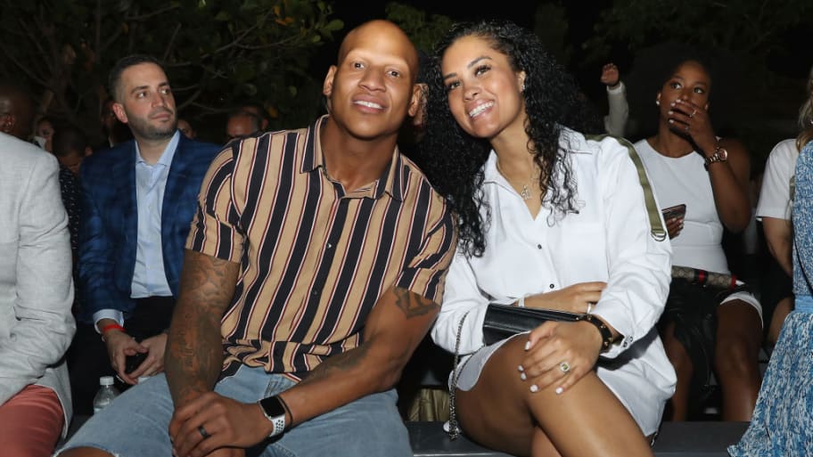 Ryan Shazier and his now-estranged wife Michelle Rodriguez smile next to each other at an event.