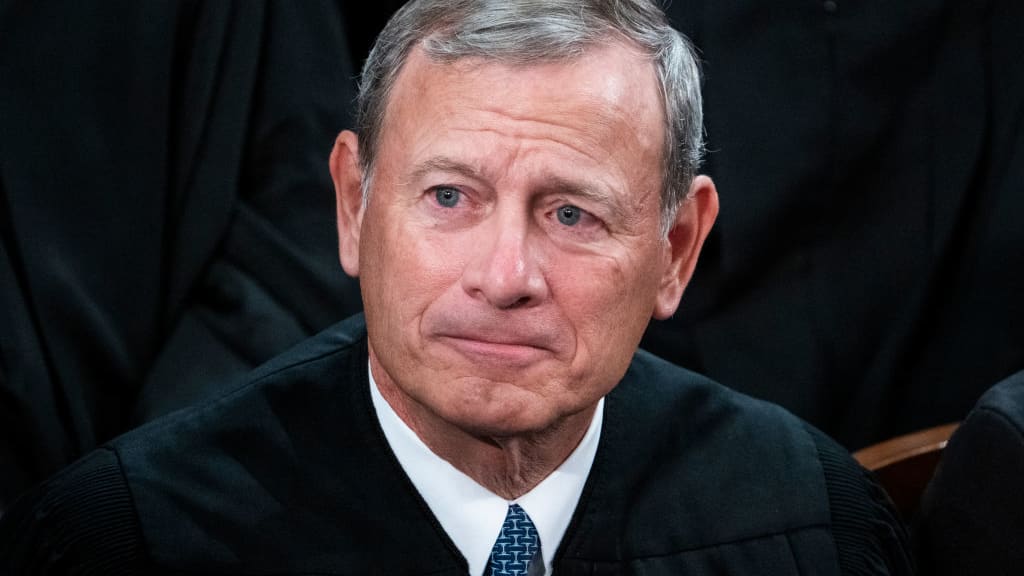 A Florida man was sentenced to 14 months in prison on Tuesday for threatening to kill Chief Justice John Roberts.