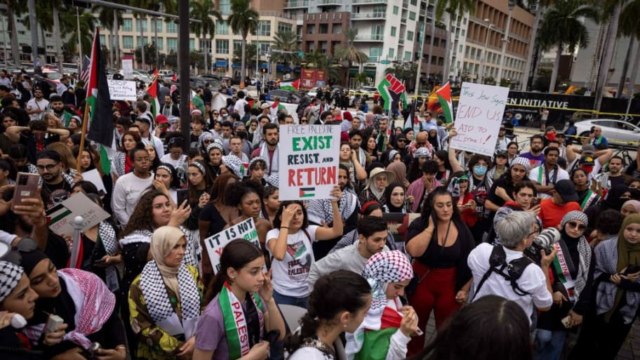 People attend a rally in support of Palestinians in the Gaza Strip at Bayfront Park in Miami, Florida.
