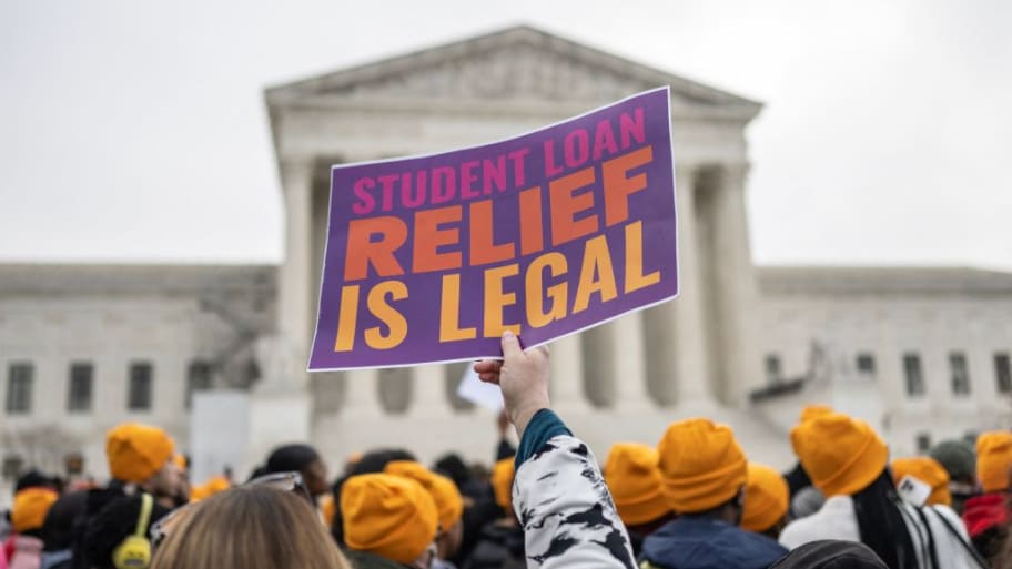 Activists and students protest in front of the Supreme Court during a rally for student debt cancellation in Washington, DC, on February 28, 2023.