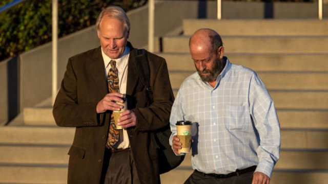 Defendant Jerry Boylan, right, captain of the Conception dive boat, arrives at Federal Court in Los Angeles.