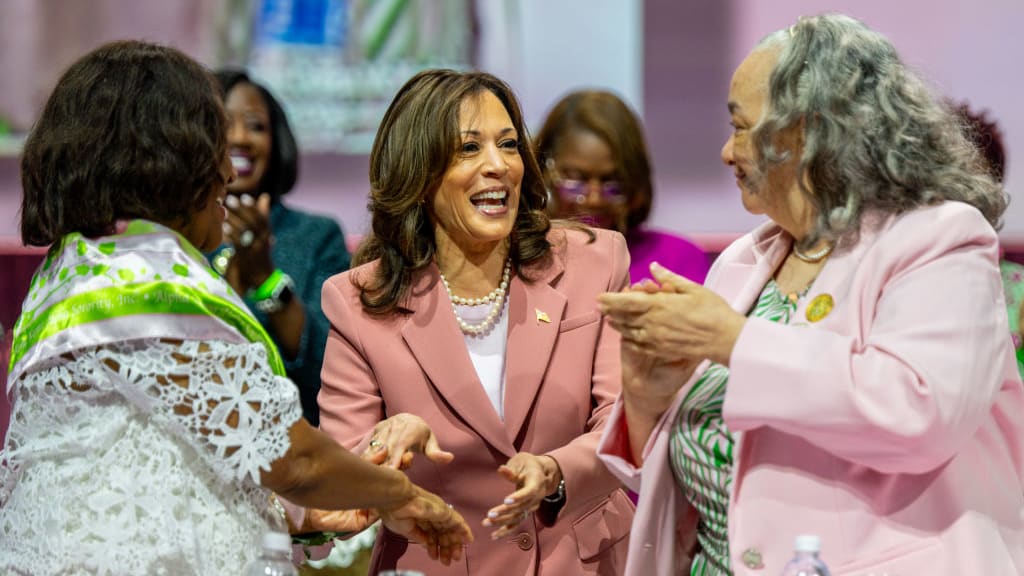 Harris greets members of her sorority at a July 2024 event in Dallas. 