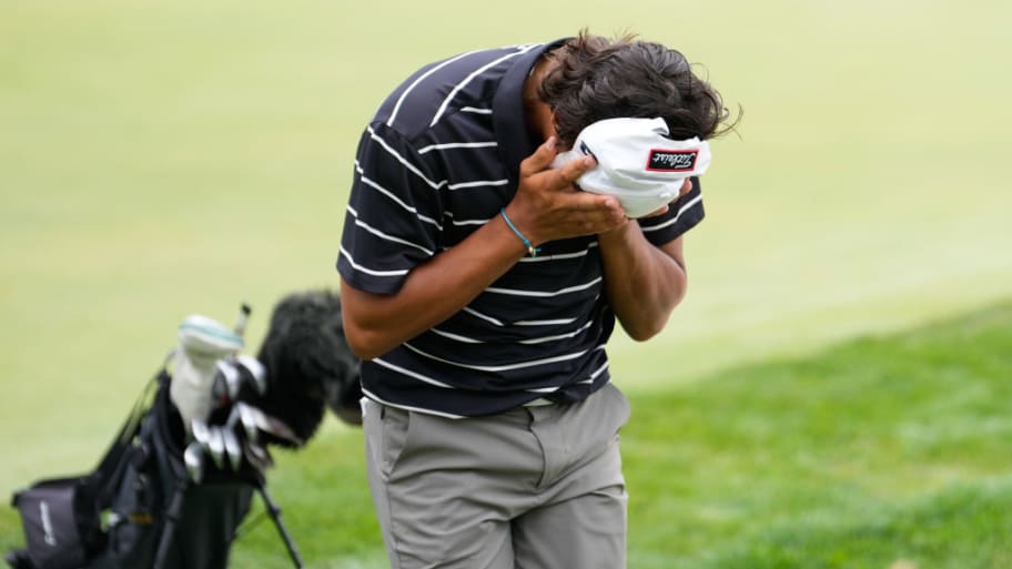 Charlie Woods reacts after his round on the 18th hole on day one of the 76th U.S. Junior Amateur Championship.