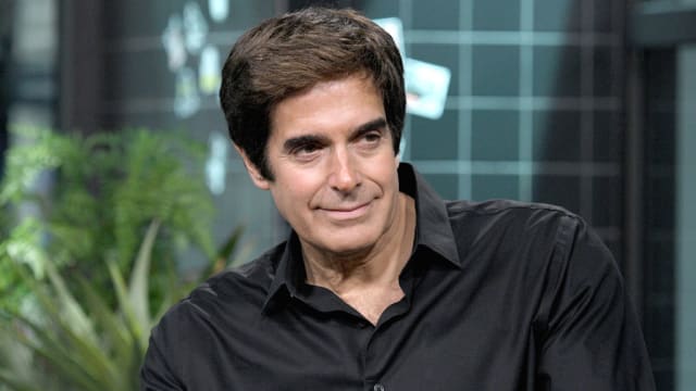 David Copperfield listens to a question during an HBO documentary.
