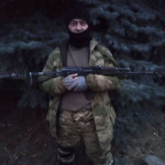 A photograph of Alexander Teploukhov, nickname "Teply," in Donetsk region of Ukraine.