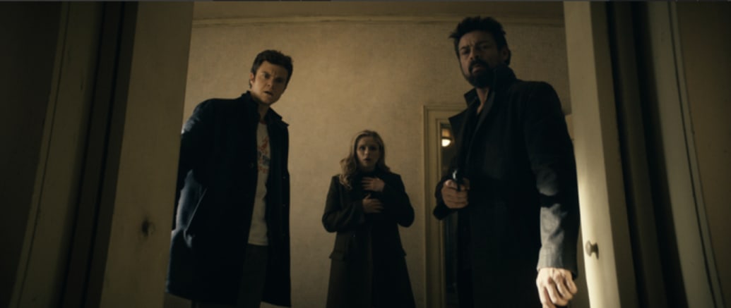 A photo still of Jack Quaid, Erin Moriarty, and Karl Urban