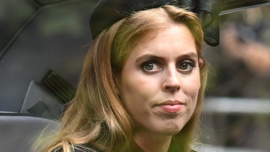 Princess Beatrice of York follows the coffin of Queen Elizabeth II as it travels on the State Gun Carriage of the Royal Navy, from Westminster Abbey to Wellington Arch, Sept. 19, 2022, in London, England.