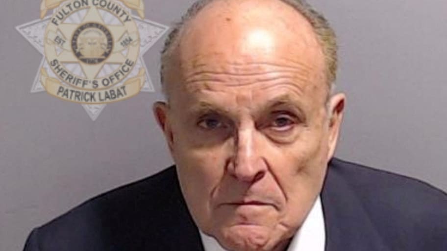 Rudy Giuliani is shown in a police booking mugshot released by the Fulton County Sheriff’s Office.