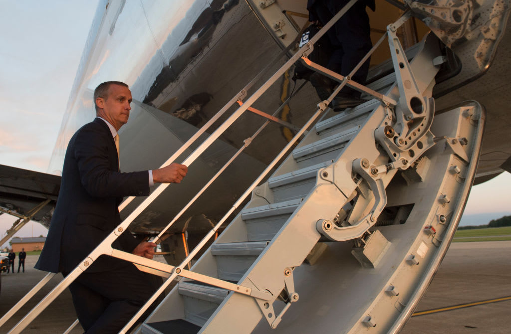 Donald Trump’s campaign aide Corey Lewandowski boards Air Force One in 2017.