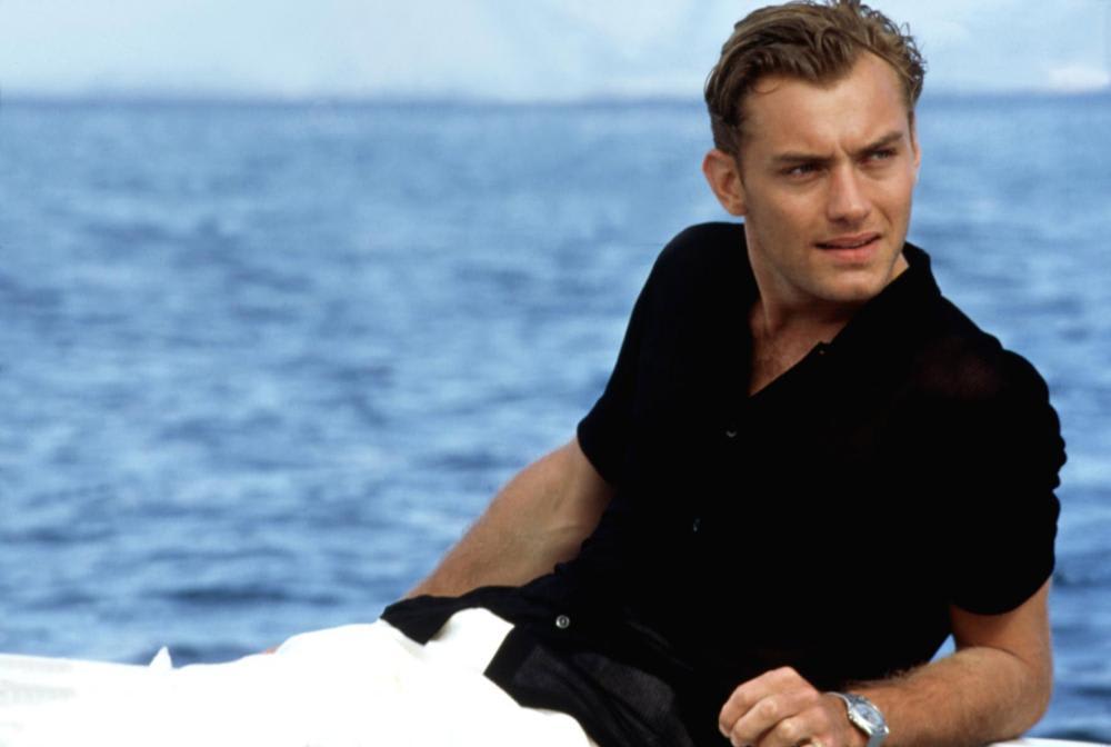 Scene from 'The Talented Mr. Ripley' shows Jude Law lying on a boat.