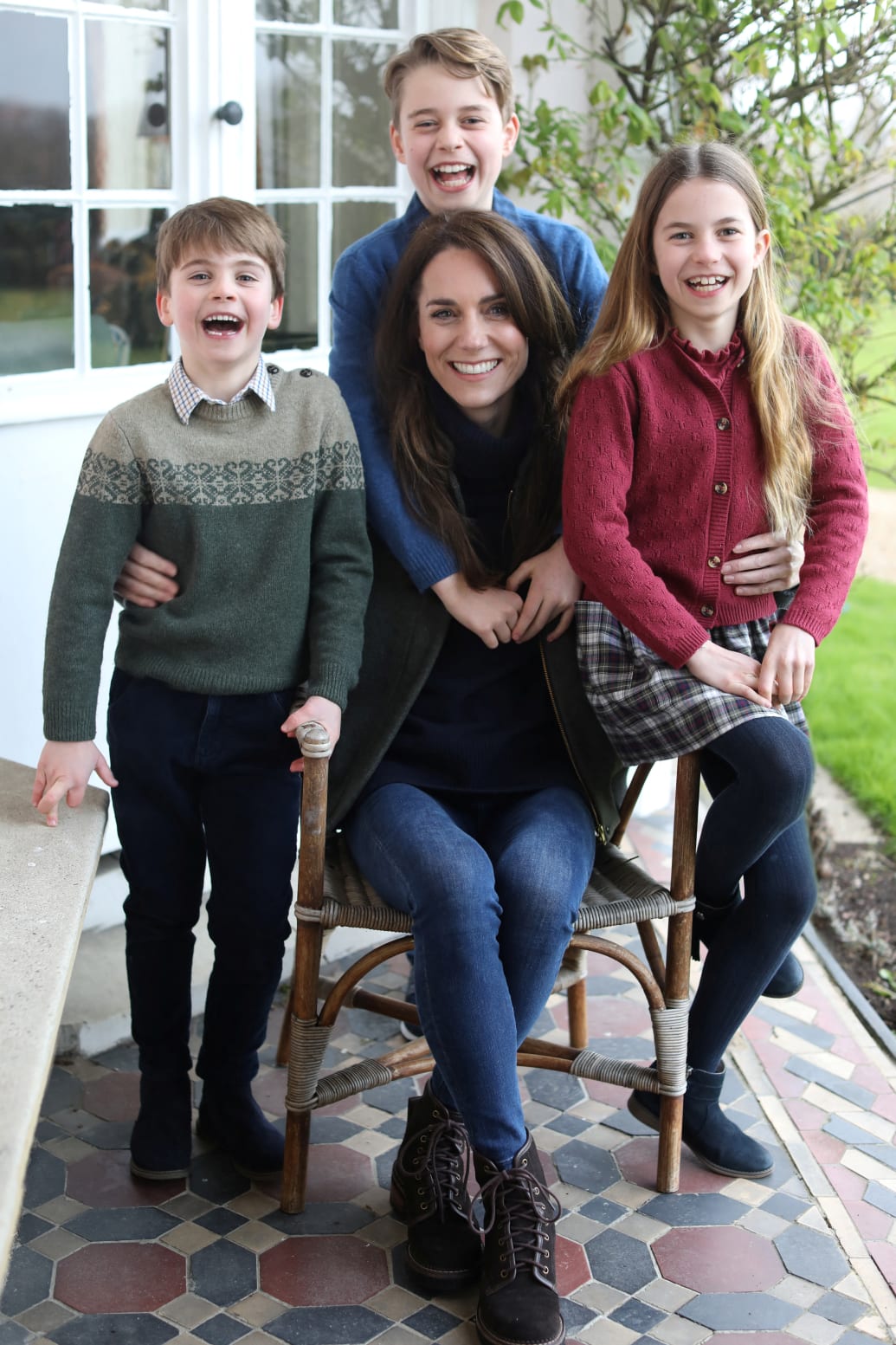 The U.K. Mother's Day photograph Prince William reportedly took of Kate Middleton and their children that Kate later admitted she had doctored.