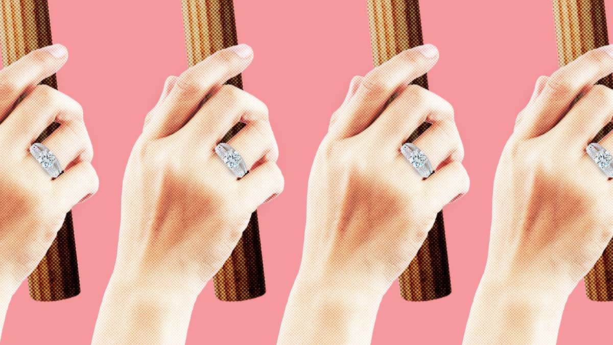 A photo illustration of women’s hands with a diamond ring holding picket signs