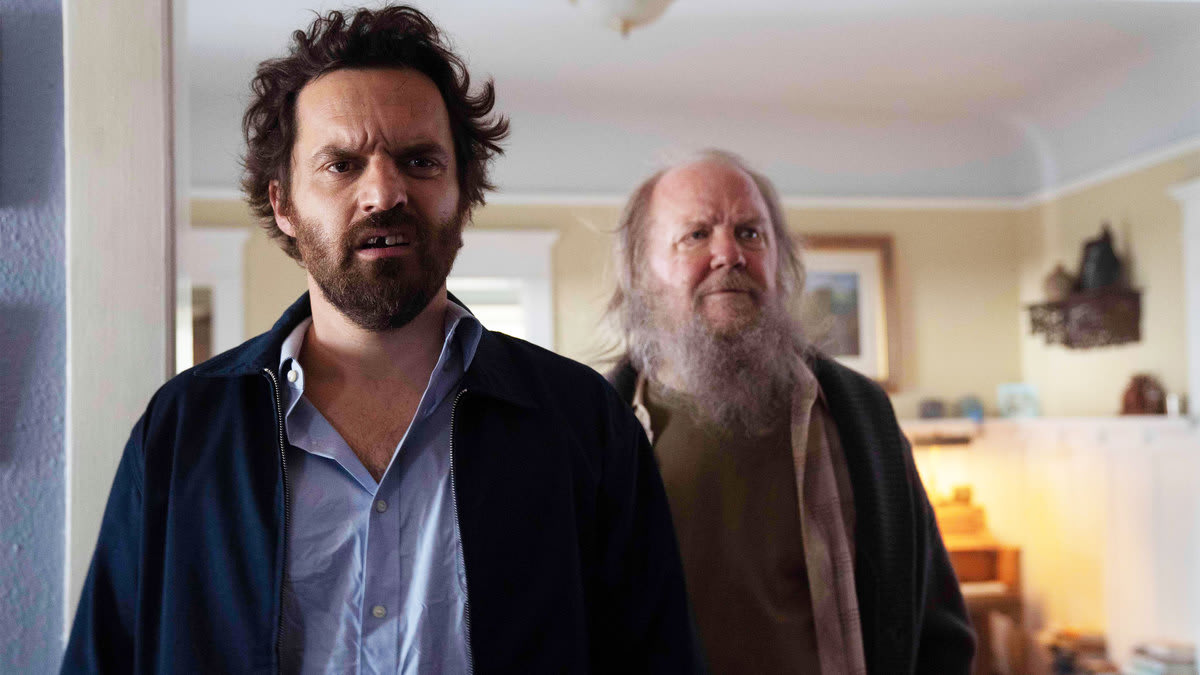 A photo including Jake Johnson and Biff Liff in the film Self Reliance on Hulu