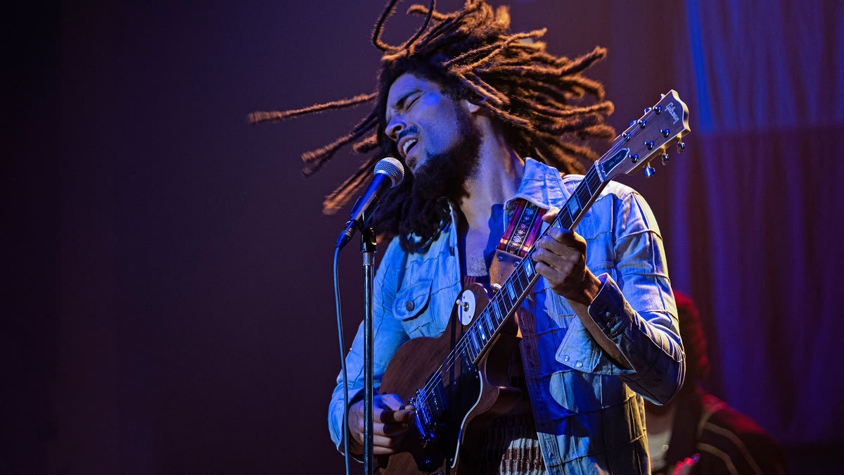 Kingsley Ben-Adir as Bob Marley singing in a still from ‘One Love’