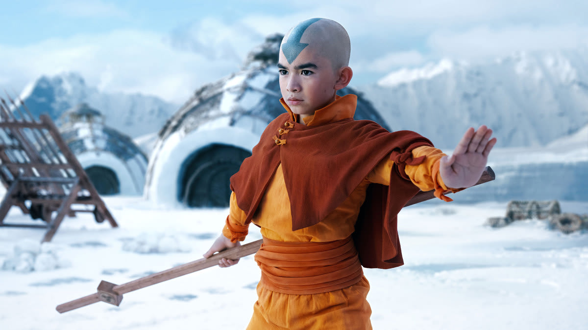 Gordon Cormier holds a staff in a still from ‘Avatar: The Last Airbender’