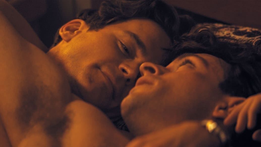 Jonathan Bailey and Matt Bomer in bed together in a still from ‘Fellow Travelers’