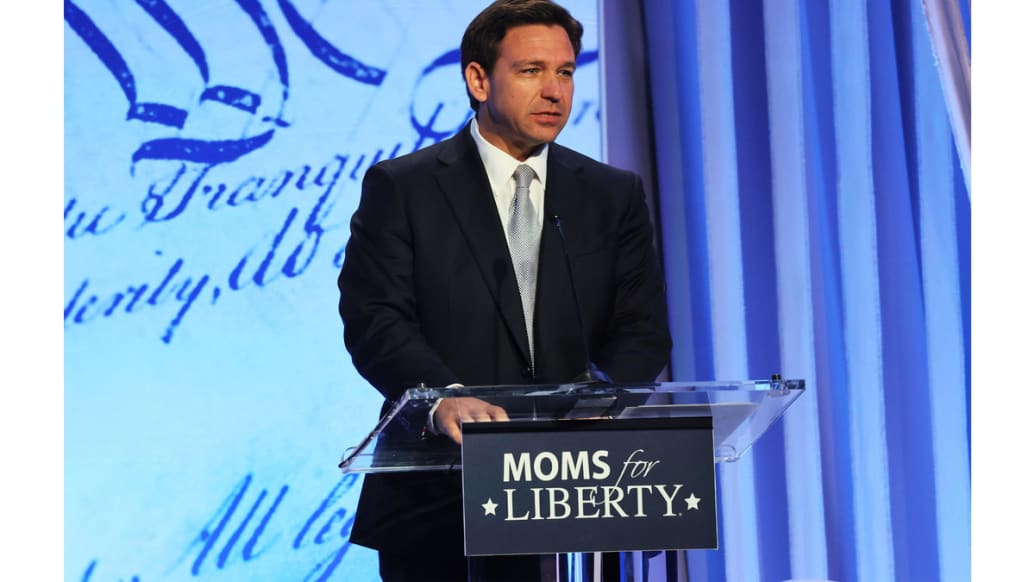 A photo of Ron DeSantis speaking at the Moms for Liberty Joyful Warriors National Summit at The Philadelphia Marriott Downtown.