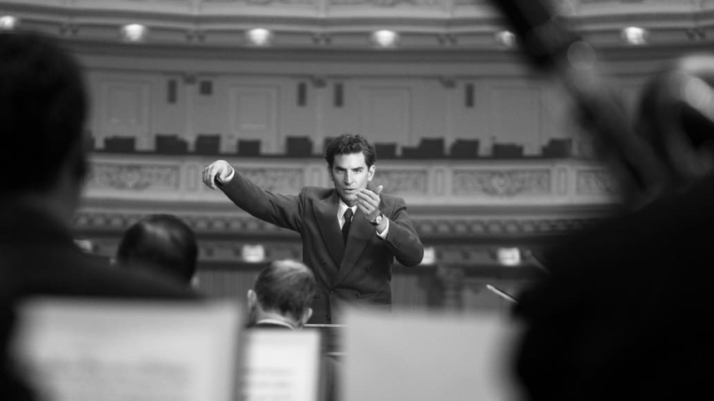 A photo including Bradley Cooper as Leonard Bernstein  in the film Maestro