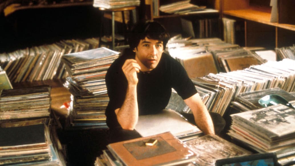 A photo including John Cusack in the film High Fidelity