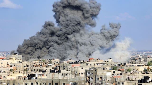 Smoke billows during an Israeli air strike in Rafah in the southern Gaza Strip on October 11, 2023. Israel declared war on Hamas on October 8 following a shock land, air and sea assault by the Gaza-based Islamists.