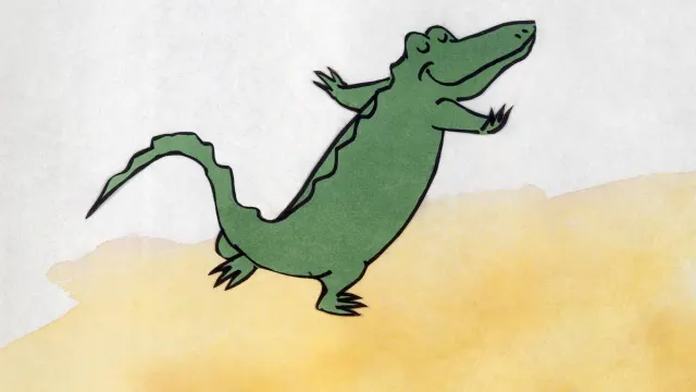 A crocodile stands on his hind legs, smiling.