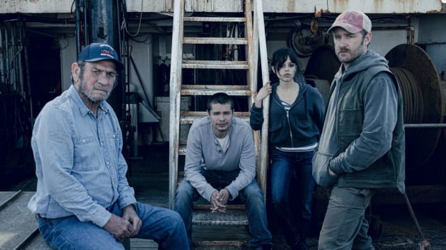 Tommy Lee Jones as Ray, Toby Wallace as Charlie, Jenna Ortega as Mabel and Ben Foster as Tom pose on a boat in a still from ‘Finestkind’