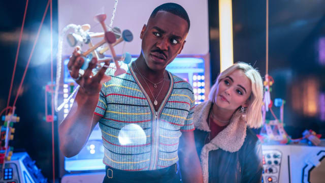 Ncuti Gatwa and Millie Gibson look at a large molecule in a still from ‘Doctor Who’