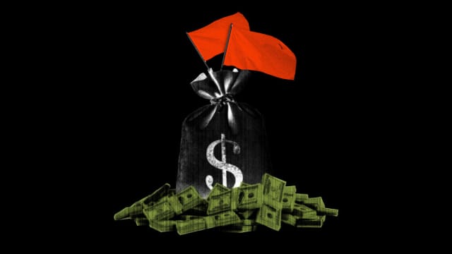 Photo illustration of a bag of money with red flags coming out of it on a black background.