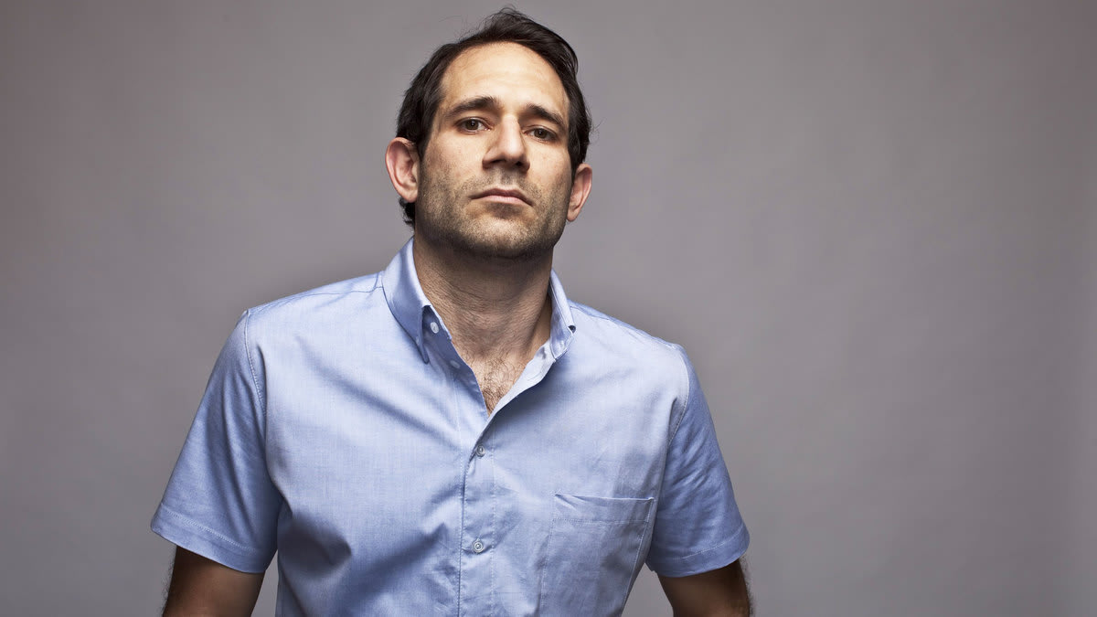 how did american apparel creep dov charney get a military contract?