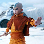 Gordon Cormier holds a staff in a still from ‘Avatar: The Last Airbender’