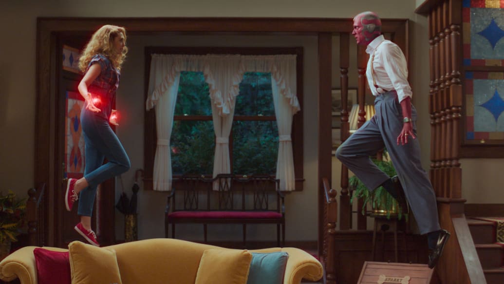 The Scarlet Witch and Vision levitate and face off in a still from ‘Wandavision’