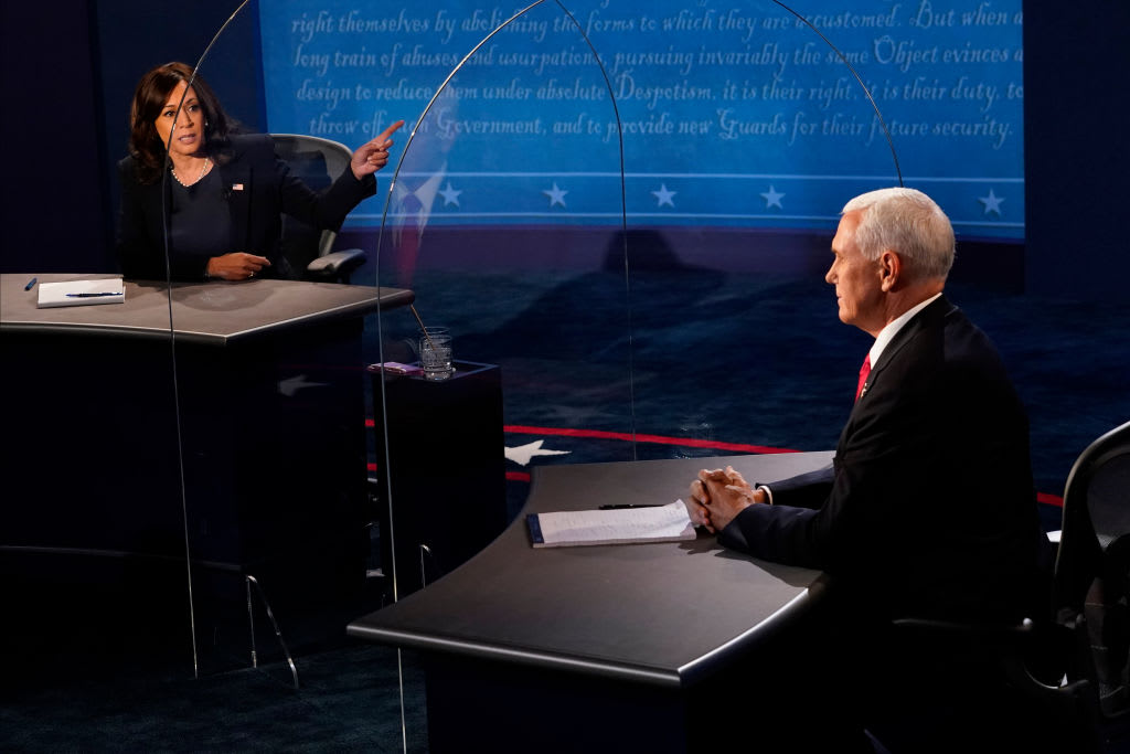 Then-Democratic vice presidential nominee Kamala Harris and then-Vice President Mike Pence participate in a vice presidential debate at the University of Utah in 2020. 