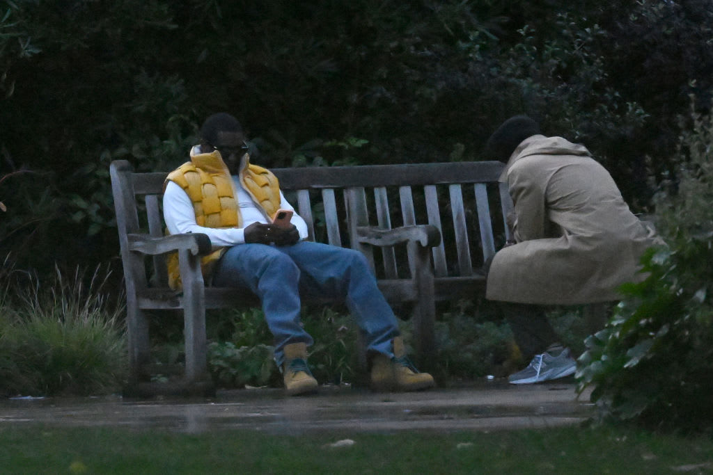 Diddy posts up on a bench in London.