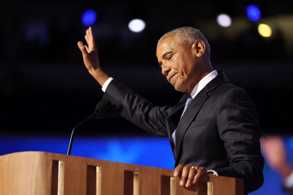 Former US President Barack Obama gestures as he speaks on the second day of the Democratic National Convention (DNC) in Chicago.