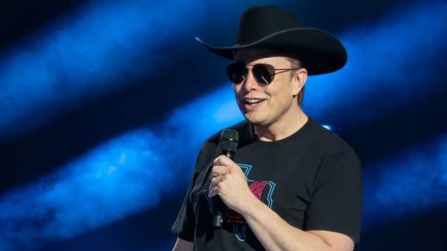 Elon Musk wearing a cowboy hat.