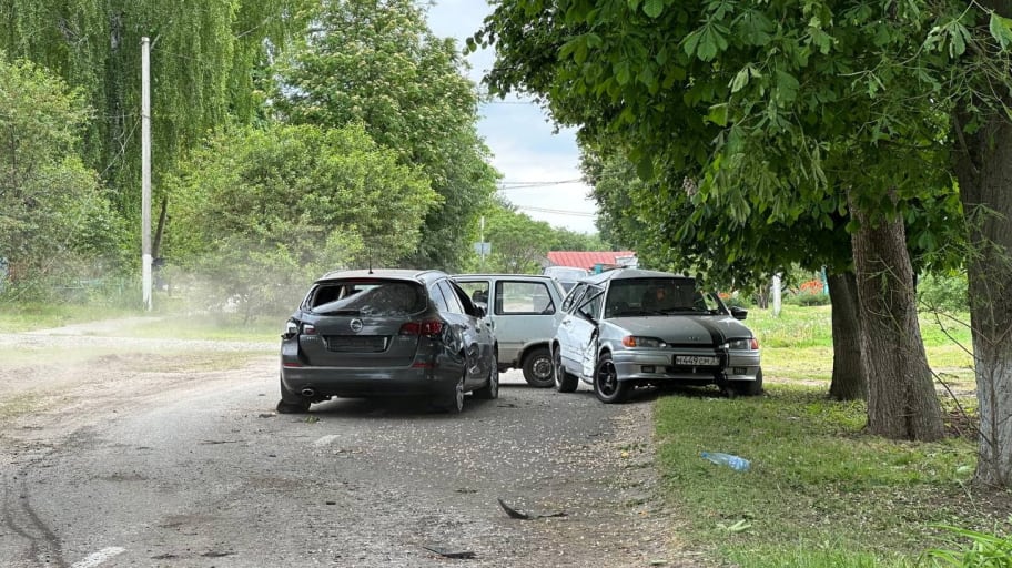 A view shows damaged cars on a road in this handout image released May 23, 2023.
