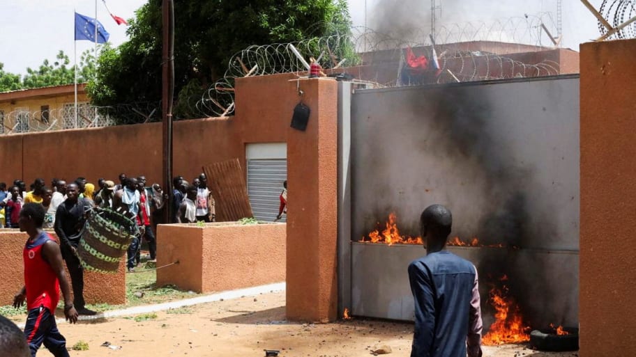 "Pro-junta demonstrators gathered outside the French embassy, try to set it on fire before being dispersed by Nigerien security forces in Niamey, the capital city of Niger July 30, 2023.