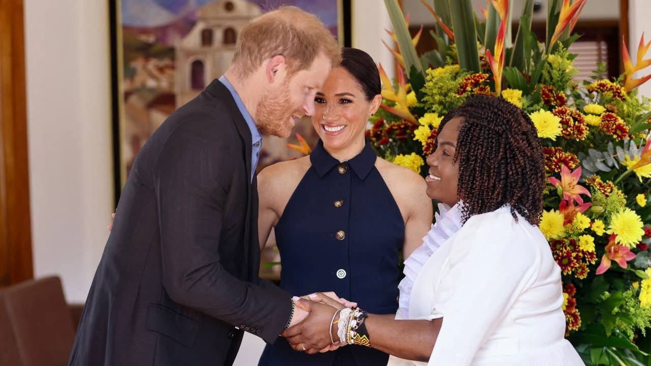 Prince Harry and Colombia's Vice President Francia Marquez shake hands, as Meghan, Duchess of Sussex, looks on, in Bogota, Colombia August 15, 2024.