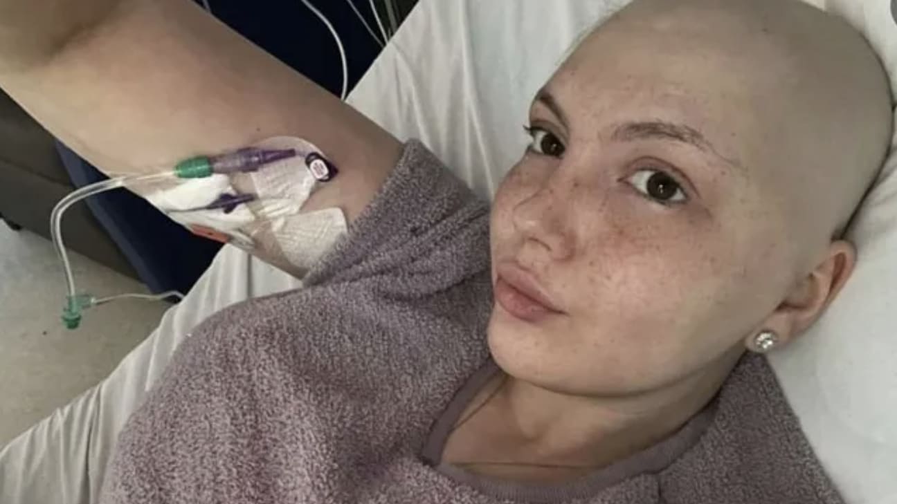 Leah Smith takes a selfie from a hospital bed.