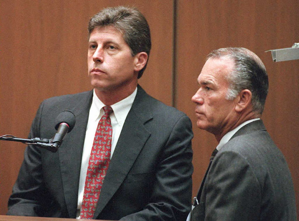 Former LAPD Detective Mark Fuhrman, left, takes to the witness stand in the O.J. Simpson double-murder trial.