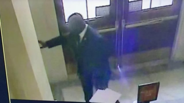 Security footage of Rep. Jamaal Bowman pulling a fire alarm.