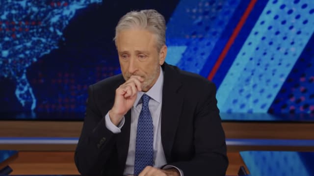 Image of Jon Stewart choking up.