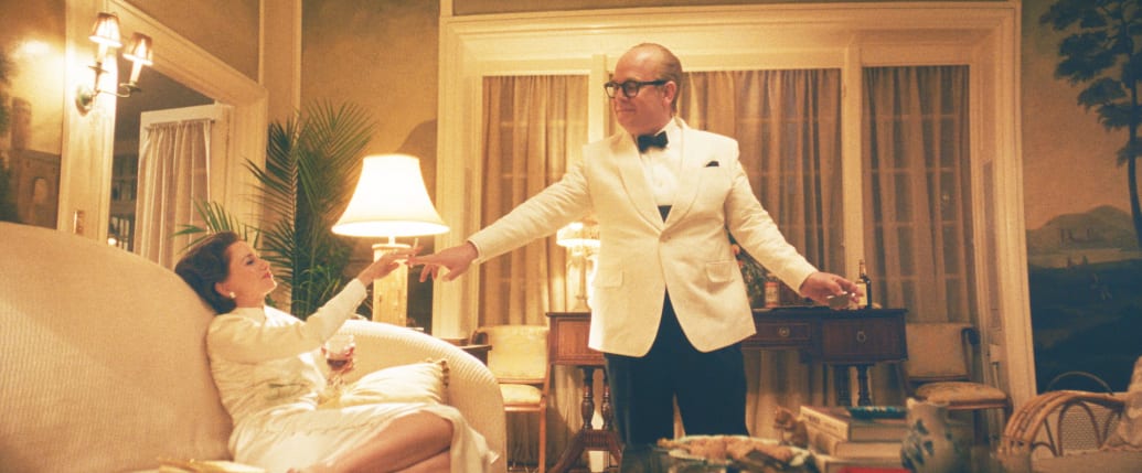 A still from FEUD: Capote Vs. The Swans premiere pilot episode showing Naomi Watts as Barbara "Babe" Paley, Tom Hollander as Truman Capote.
