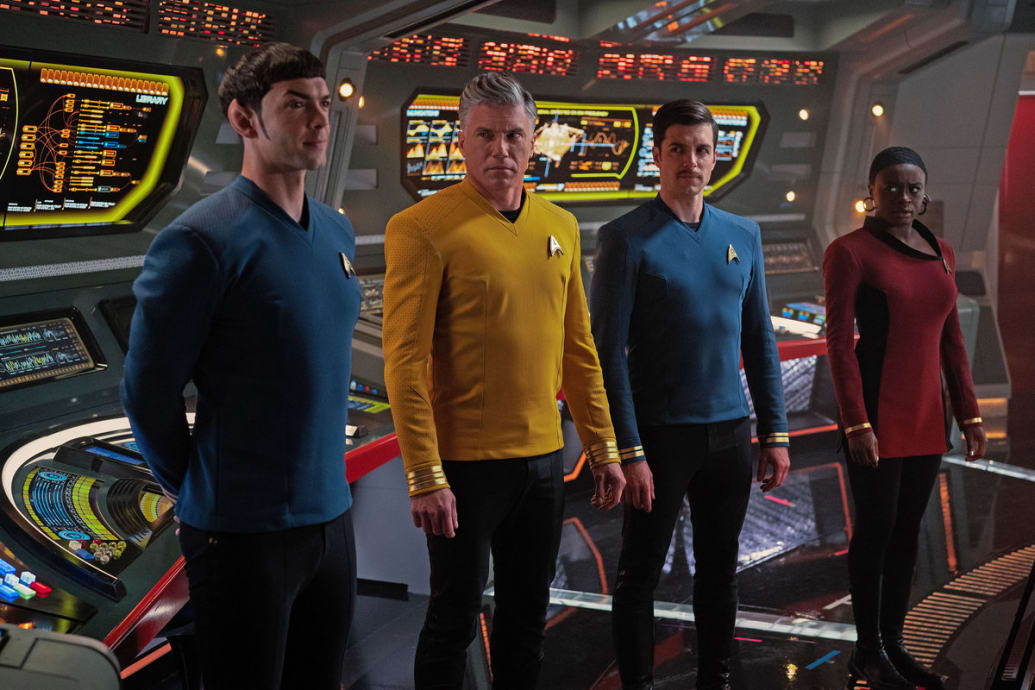 A picture of Ethan Peck as Spock, Anson Mount as Pike, Dan Jeannotte as Samuel Kirk, and Celia Rose Gooding as Uhura in Star Trek: Strange New Worlds.